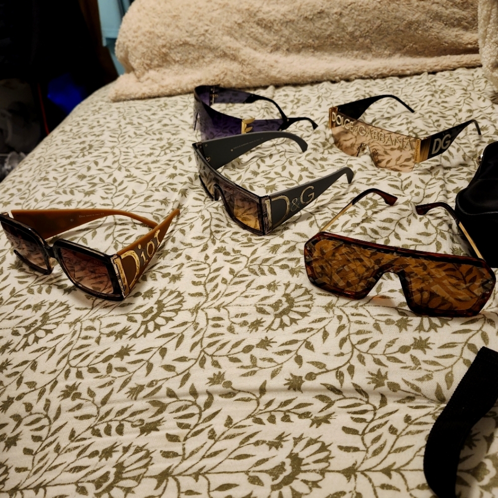 Two pair of dolce & Gabbana sunglasses, to pair of Fendi sunglasses, and Dior